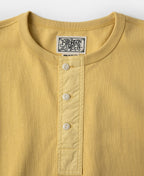 Vintage-kollane lühikeste varrukatega Henley T-särk, pleekinud ja vabaaja stiilis