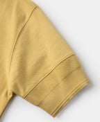 Vintage-kollane lühikeste varrukatega Henley T-särk, pleekinud ja vabaaja stiilis